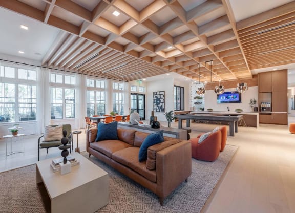 a living room with a couch and a table