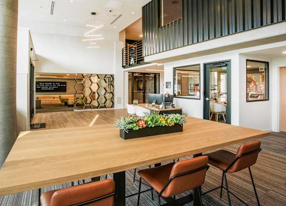 A conference room with a long table and chairs.at Axle, Washington, 98119