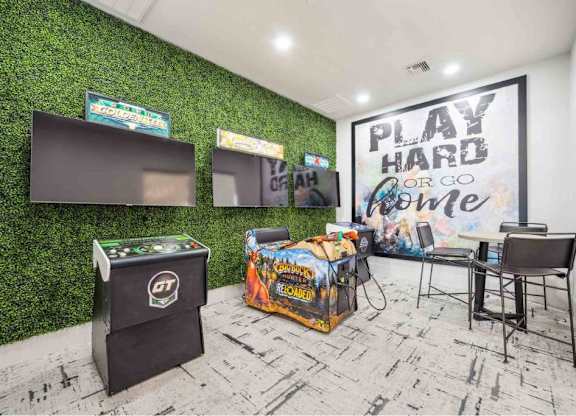 A room with a green wall and a sign that says