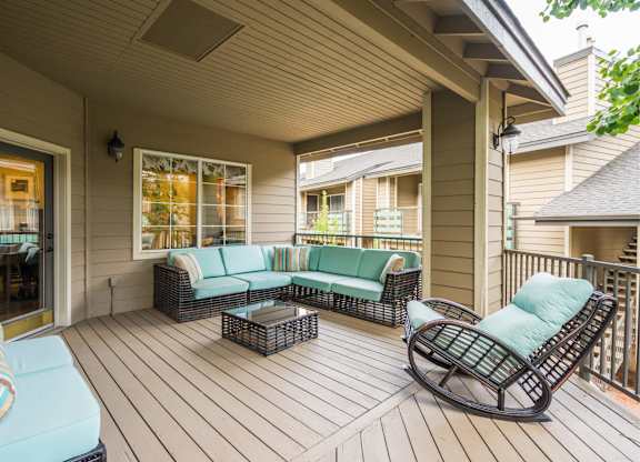 A Wooden Deck With Soda and Chairs at The Summit at Flagstaff, Arizona