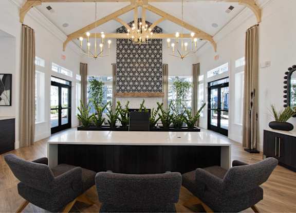 the lobby with a reception desk and chairs