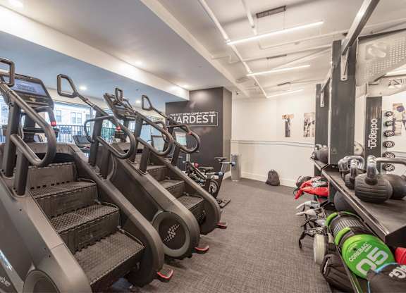 A gym with treadmills and exercise equipment.