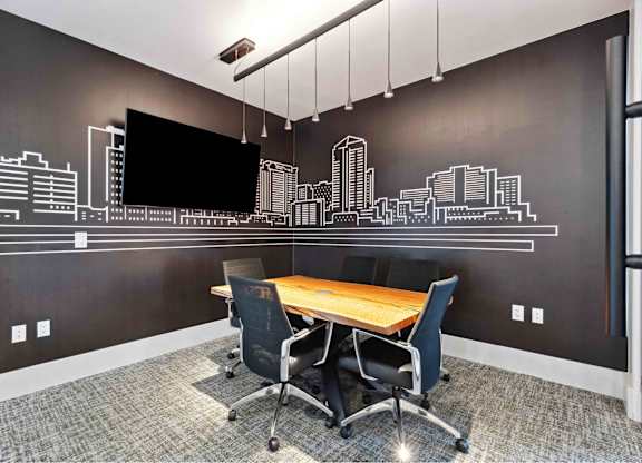our office has a large conference room with a table and chairs