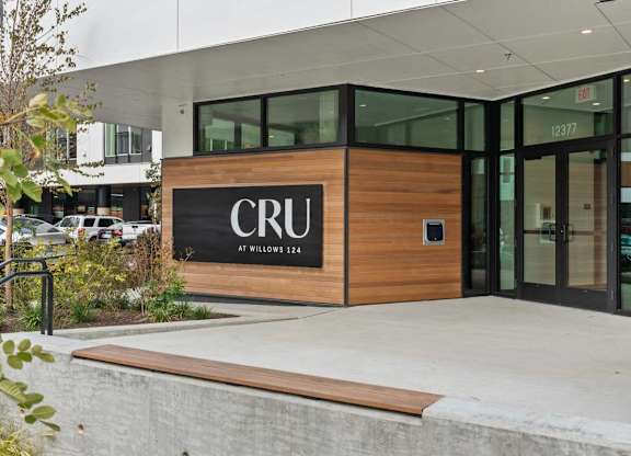 The front of a building with the letters CRU on it.