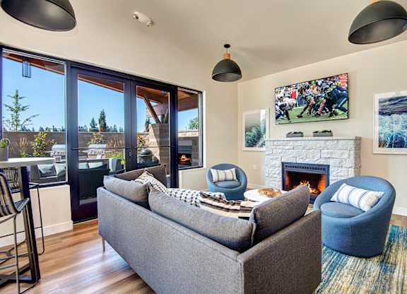 Clubroom With Fireplace at The Pacifica Apartments, Tacoma, Washington