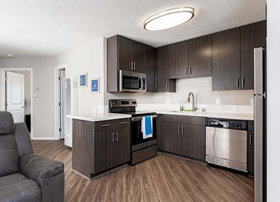 Open Kitchen with Living Room at Village Square, California, 92037
