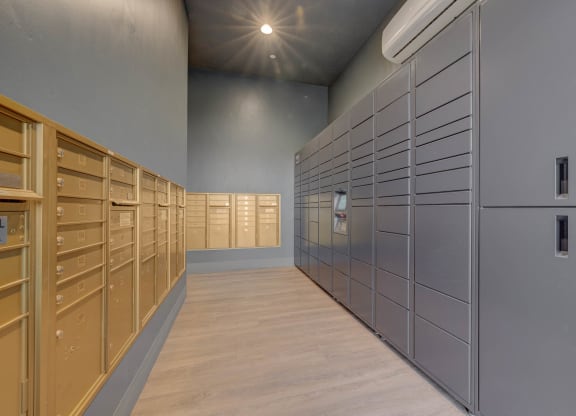 a bunch of lockers in a room with wood floors