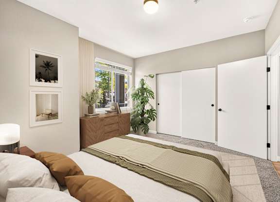 A bedroom with a bed, a dresser, and a window.