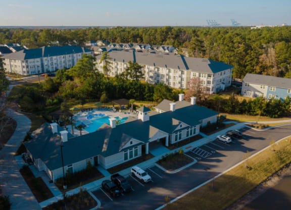 an aerial view of the resort properties with a swimming pool