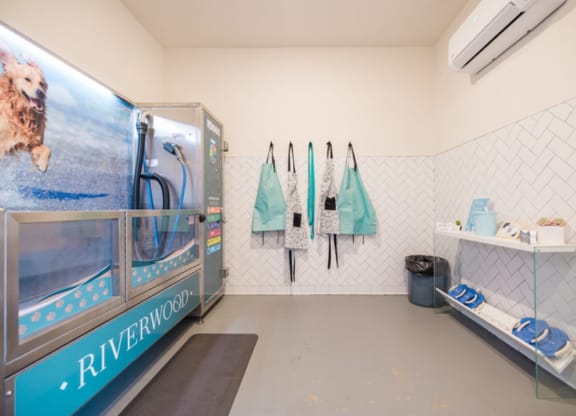 a laundry room with a washer and dryer