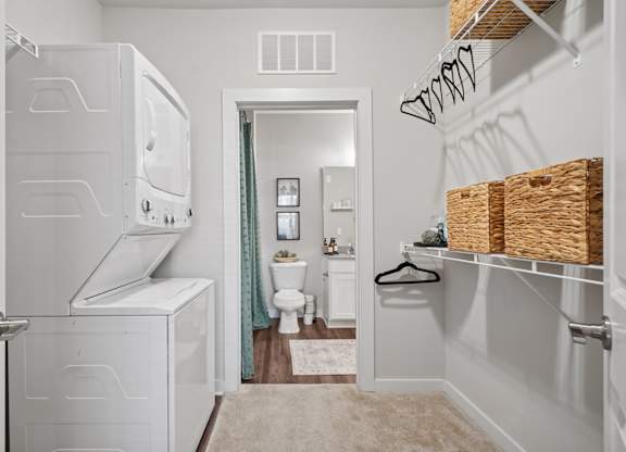A laundry room with a washer and dryer.