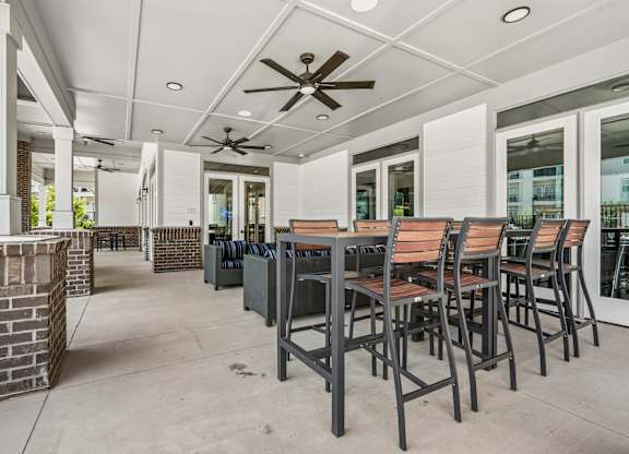 A patio with a table and chairs is shown.