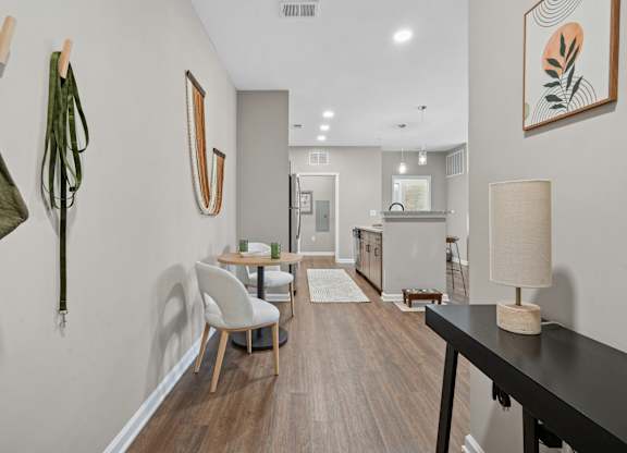 A room with a table and chairs at Fox Hunt Farms Fort Mill, SC apartments.
