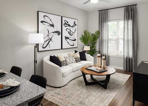 a living room with a couch and a table