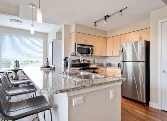 Gourmet Kitchen With Island at The Pacifica Apartments, Tacoma, WA, 98409