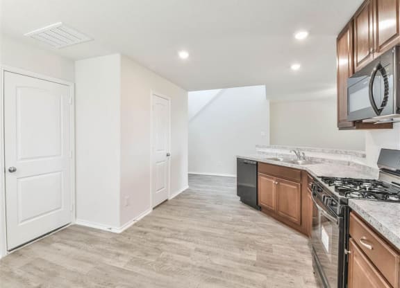 Open Concept Kitchen at The Village at Caney Mills, Conroe, 77303