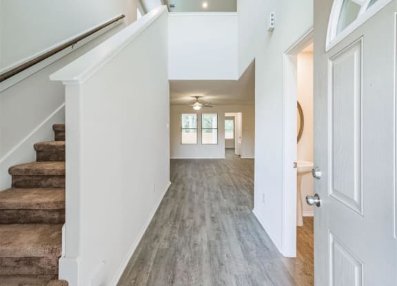 Staircase And Hardwood Floors at The Village at Caney Mills, Conroe, TX, 77303