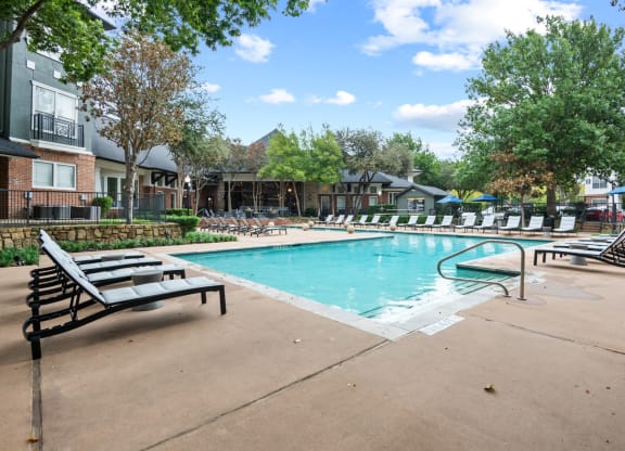 Sparkling pool with fountains at Mission Gate, Plano, TX