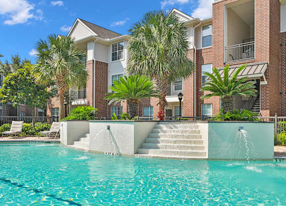 Outdoor Resort Style Pool at Madison on the Meadow Apartments in Stafford, TX 77477