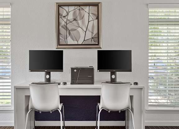 a white desk with two monitors and two chairs  at Verona, Littleton, Colorado