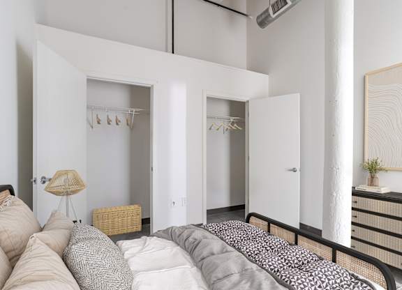 Bedroom with Walk-In Closet at Highland Mill Lofts in Charlotte, North Carolina 28205