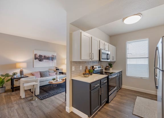 our apartments at the district feature a spacious kitchen and living room at Paisley and Pointe Apartments, Las Vegas, Nevada