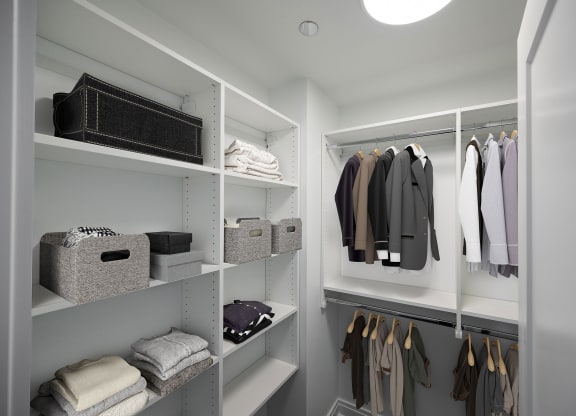 a walk in closet with a lot of shelves and clothes  at The Belden Stratford, Chicago, 60614