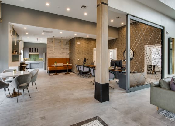 the lobby with tables and chairs at Carrington at Barker Cypress, Cypress, TX, 77433
