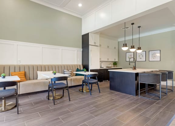 a dining room and kitchen with tables and chairs at Madison on the Meadow, Texas, 77477