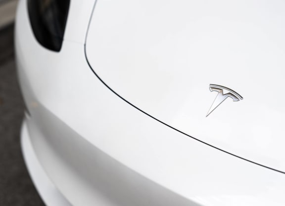 the badge on the side of a white car  at The Belden Stratford, Illinois