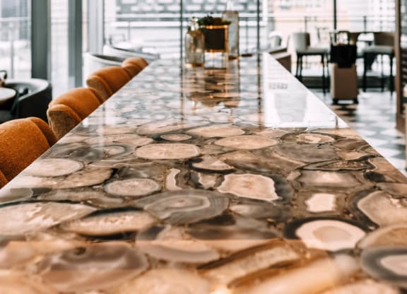 a long table with a view of the city at The Grand Central, Chicago