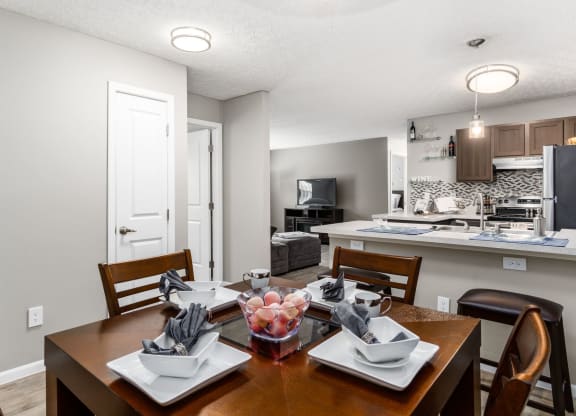 A dining room with a table set for two at Estates at Brentwood Lake Apartments, Reynoldsburg, OH, 43068