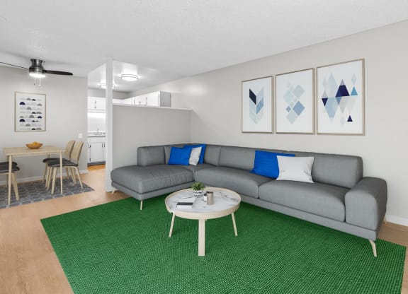 an open living room with a couch and a coffee table