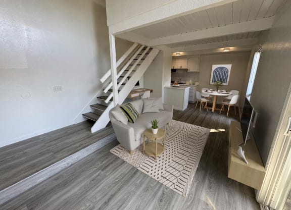 a living room with a couch and a table