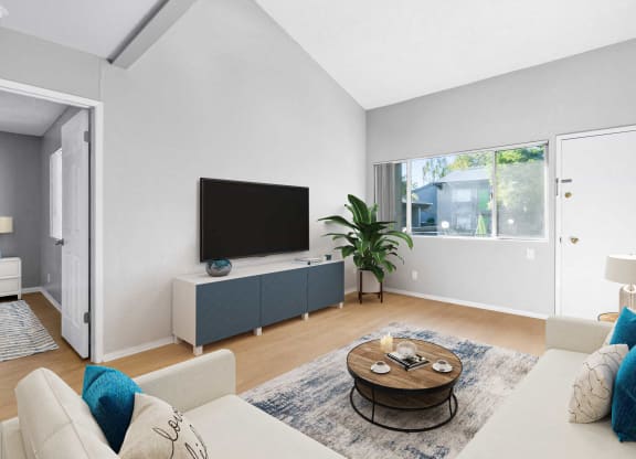 a living room with a couch and a tv