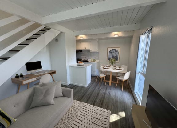 a small living room with a couch and a table
