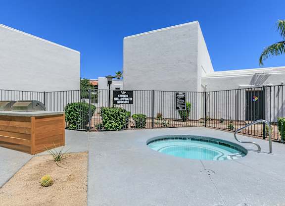 a hot tub is outside of a building with a hot pool at Tides at Mesa, Arizona