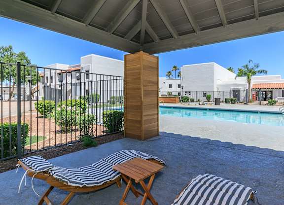 our apartments have a large pool and lounge chairs at Tides at Mesa, Mesa