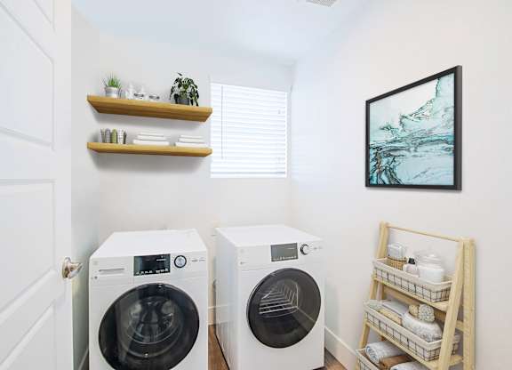 a washer and dryer in a laundry room at 2051 Apartments, Prescott, Arizona