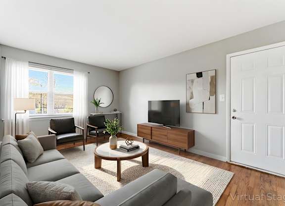Living room at Gardens at Washington Park in Atlanta, GA 30314