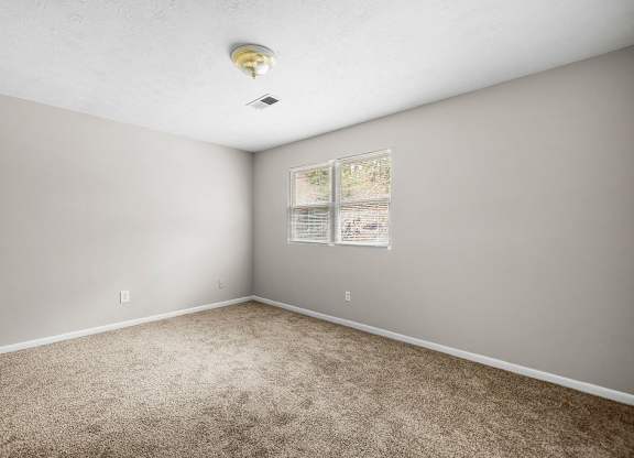 Bedroom at Bradford Gwinnett & Townhomes in Norcross, GA 30071