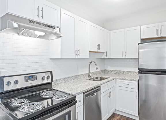 Upgraded kitchen with white cabinets at Georgian Oaks Apartments l & ll* Apartments, Georgia, 30080