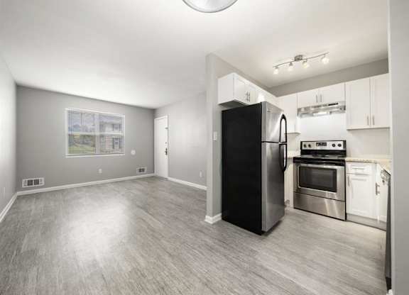 kitchen with white cabinets and stainless steel  at Georgian Oaks Apartments l & ll* Apartments, Smyrna , GA, 30080