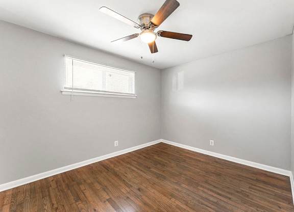 Wood-style Flooring with ceiling fan at Gardens at Washington Park, Atlanta, 30314