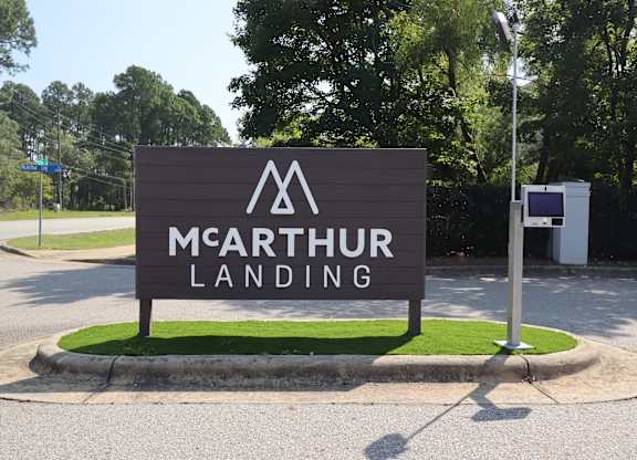 the sign at the entrance to the parking lot of the