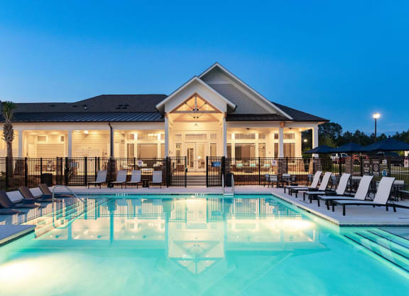 Pool and clubhouse at twilight at Carmel Vista, McDonough, GA, 30253