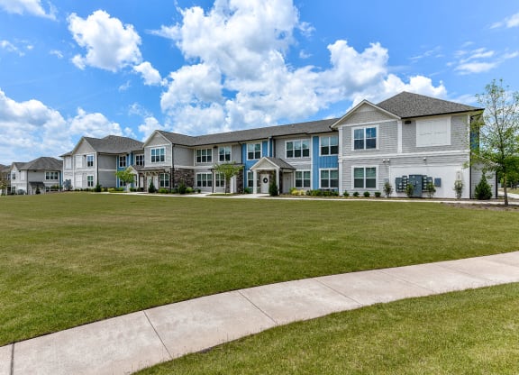 apartment community with walking path at Carmel Vista, McDonough, GA