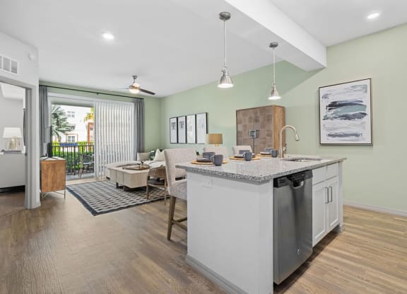a kitchen with a sink and a counter top at Inspira, Naples, 34113