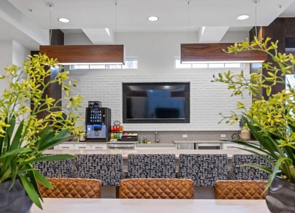 Clubhouse kitchen with gourmet coffee machine with complimentary coffee for residents at Inspira, Florida, 34113