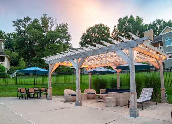 Pool cabana at dusk with the lights on at Madison Glen Mills, Glen Mills, 19342